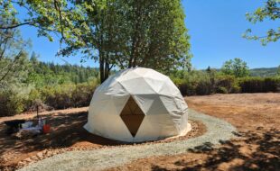 First quick build structures for temporary housing. Two 16ft geodesic domes are onsite.