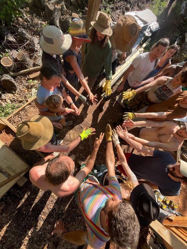 Community members working together on a gardening project at Herron Cove Community.