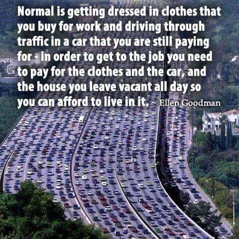 Traffic jam on a busy highway with many cars and trucks during daytime.