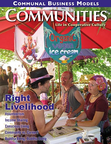 Community members at a fair promoting organic vegan ice cream and cooperative culture.