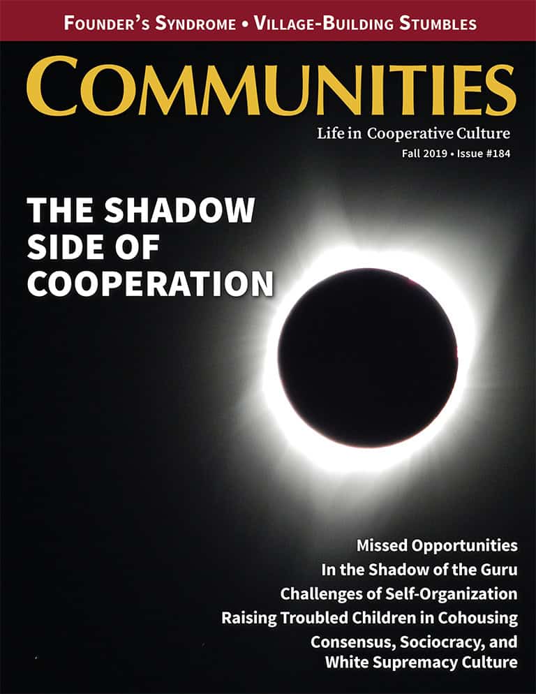 Cover of Communities magazine featuring a solar eclipse and the title 'The Shadow Side of Coöperaton.