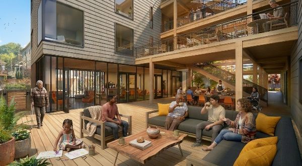 Community members relaxing on outdoor patio at Foundation for Intentional Community.
