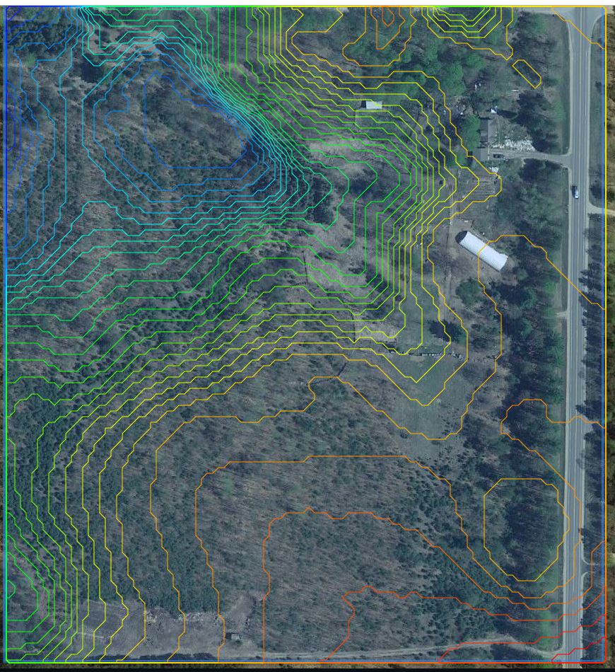 Aerial view of Morganic Farmunity with contour lines and natural landscape features.