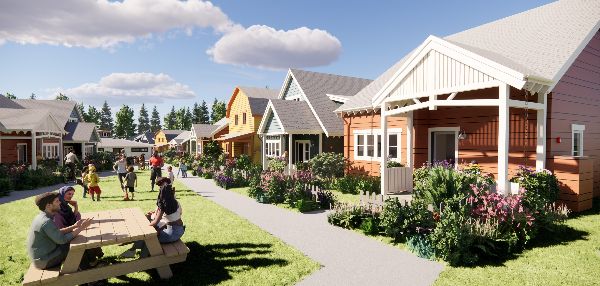 Colorful tiny houses in a community setting with people enjoying outdoors.