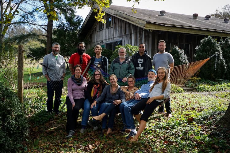 Group of diverse people outdoors at Foundation for Intentional Community event.
