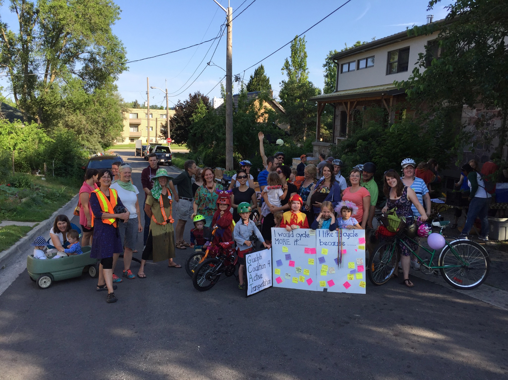 Community gathering with children and adults at a neighborhood event in Guelph.