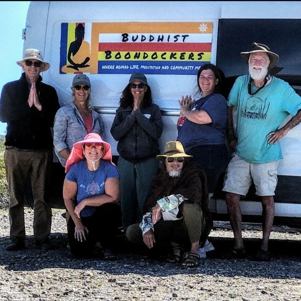 Group of people in front of Foundation for Intentional Community van.