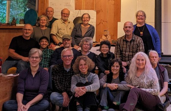 Group photo of diverse community members at Foundation for Intentional Community event.