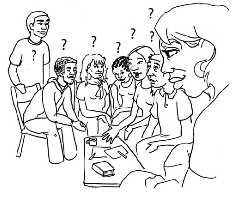 Group discussion at Foundation for Intentional Community event with questioning expressions.