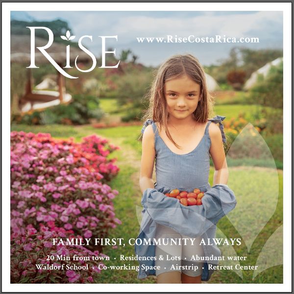 Young girl holding a basket of tomatoes in a lush garden at Rise Costa Rica.