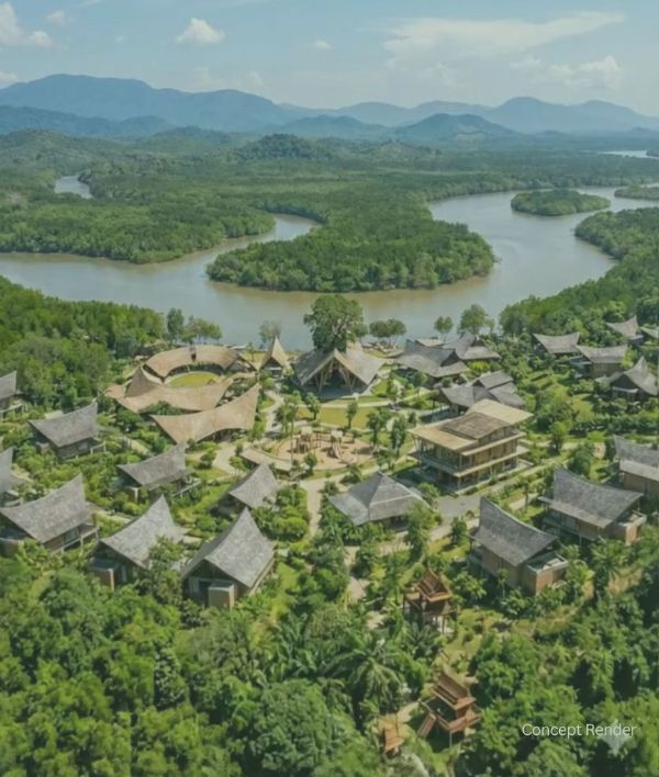 Aerial view of Bloom Village in Ranong surrounded by lush greenery and rivers.
