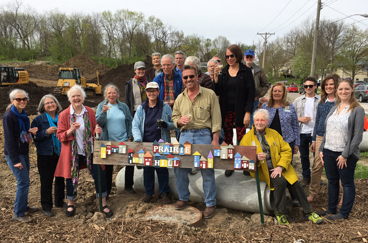 Community members celebrate groundbreaking at Prairie Hill Iowa City Cohousing project.