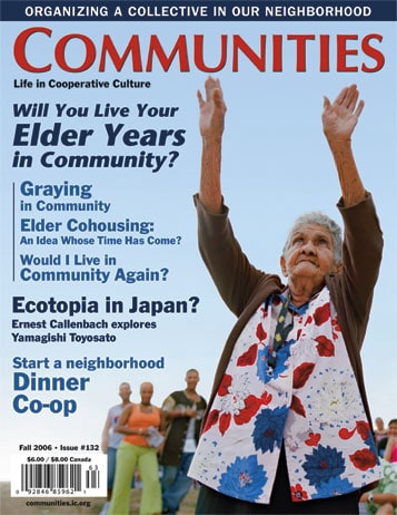 Elderly woman raising hands at community event, promoting senior involvement.
