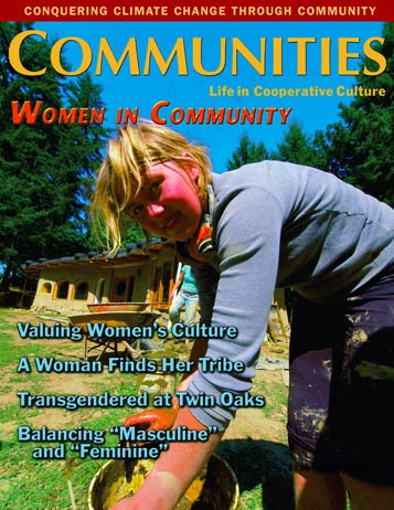 Woman gardening outdoors with community buildings in background.