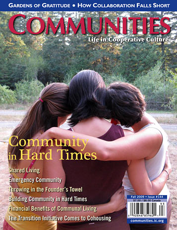 Three women embracing outdoors, symbolizing community and support.
