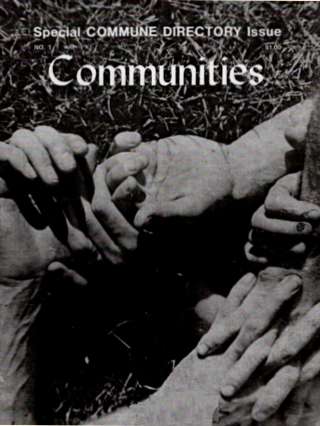 Close-up of diverse hands joined together in unity.