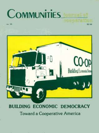 Co-op delivery truck with Building Economic Democracy slogan.