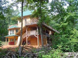Eco-friendly house in a lush forest setting at Earthaven Ecovillage.