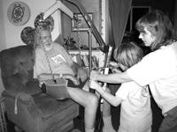 Woman receiving a medical injection in a clinical setting.