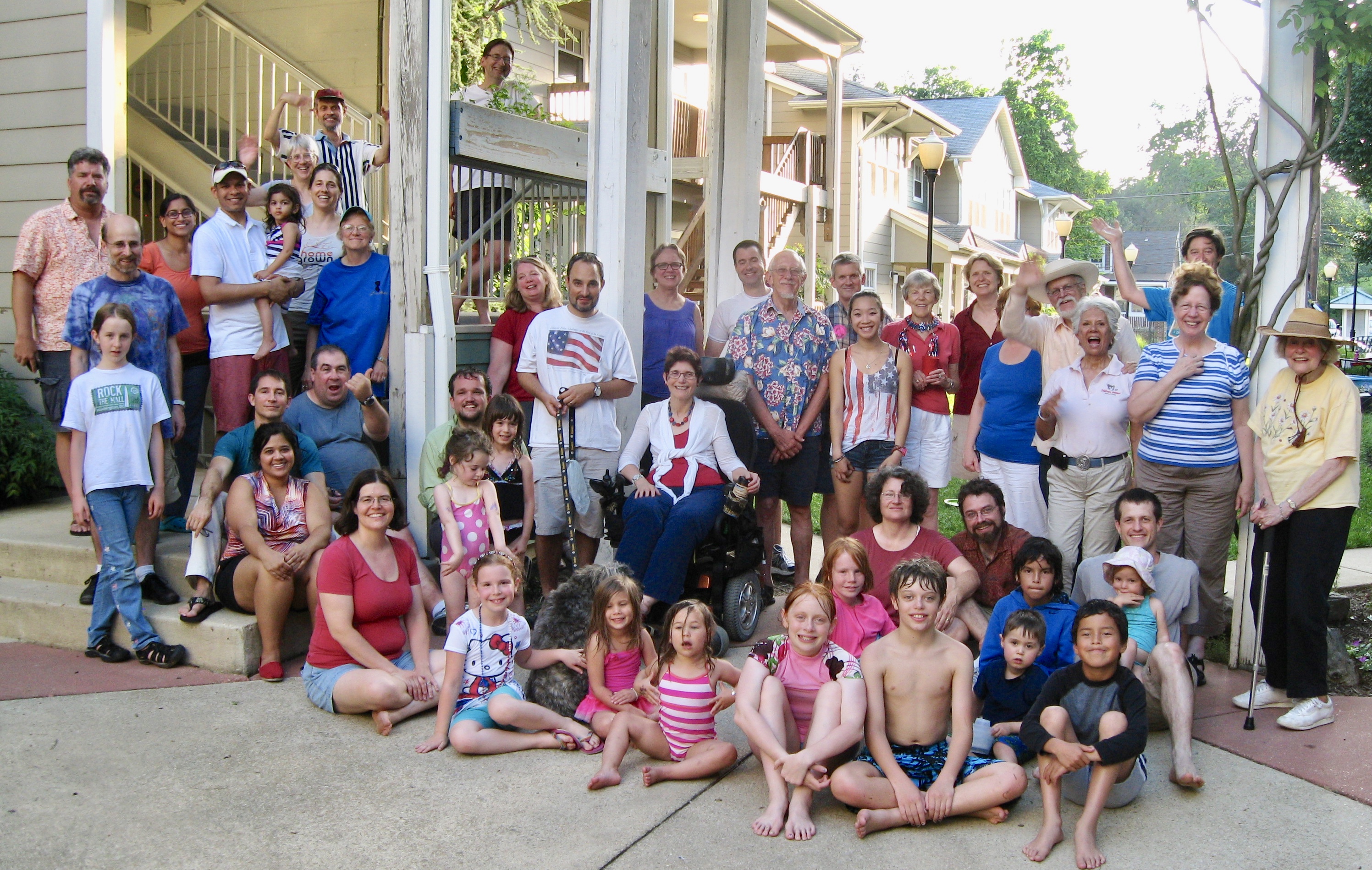 Community members of Takoma Village Cohousing gathered outdoors for a group photo.