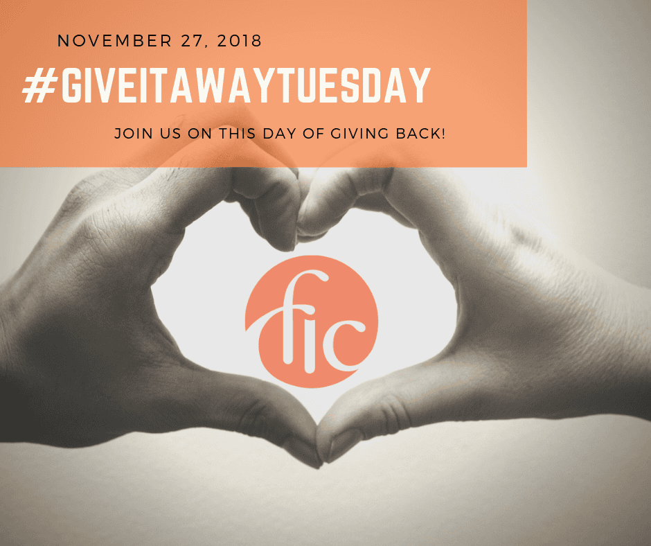 Hands forming a heart shape around the FIC logo for GiveItAwayTuesday event.
