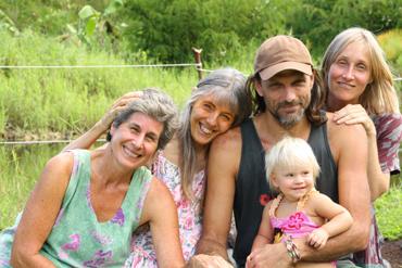 Group of happy people outdoors at a community gathering.