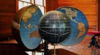 Globes representing global community and interconnectedness for intentional living.