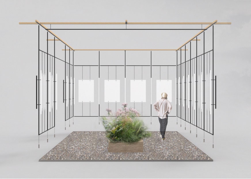Minimalist art installation with metal frames and a central plant display.