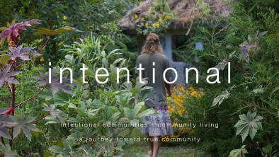 Lush garden with a person walking through, representing community living and nature.