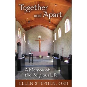 Interior of a church with wooden ceiling, cross, and pews for religious community.