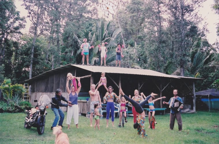 Group of people enjoying outdoor activities at a community gathering.