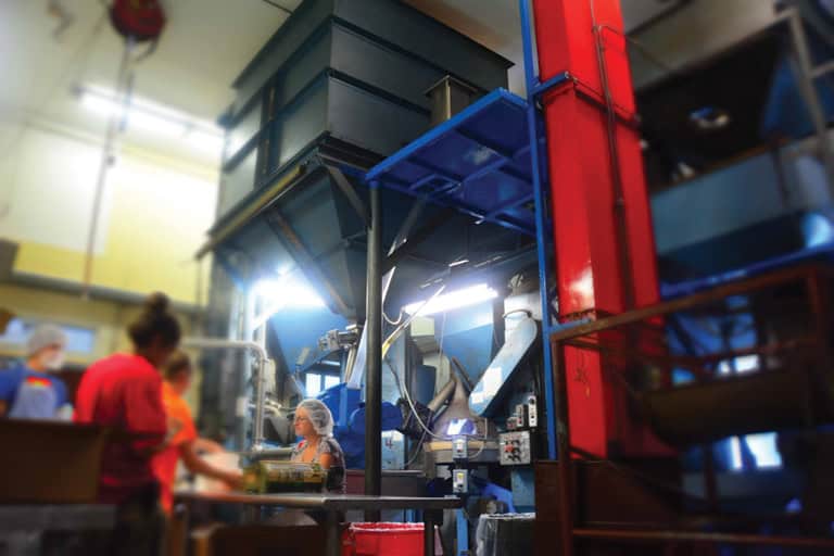 Industrial machinery at the Foundation for Intentional Community event.