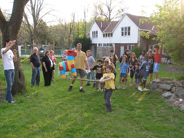 Group of people enjoying outdoor activities at Bryn Gweled Homesteads.
