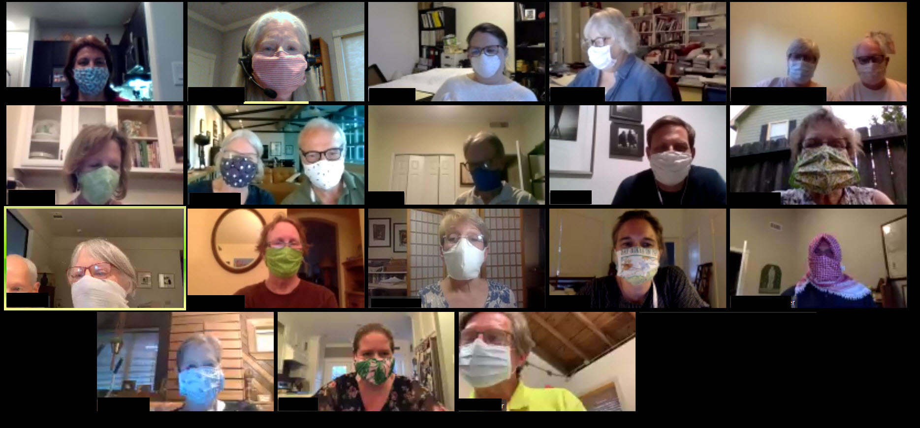 Group of diverse people in a virtual meeting, all wearing masks.