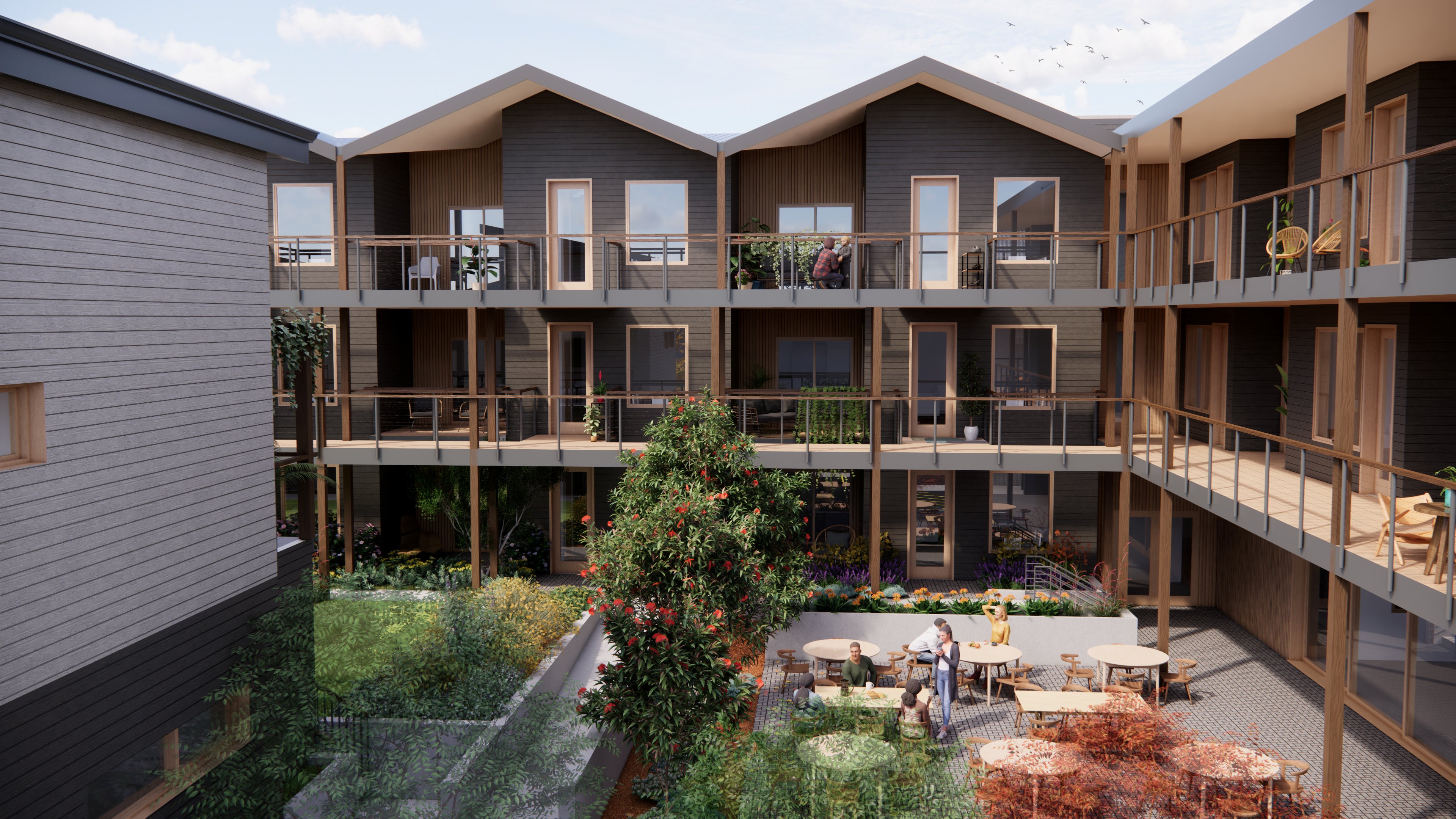 Modern cohousing apartments with shared outdoor space and garden.