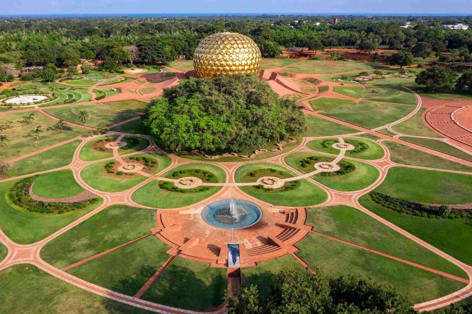 Aerial view of Epcot's geodesic sphere and surrounding gardens in Walt Disney World.