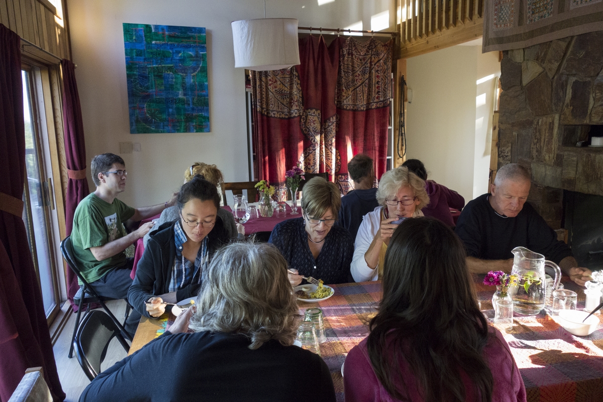 People enjoying a communal meal at Clear Sky Meditation and Retreat Center.