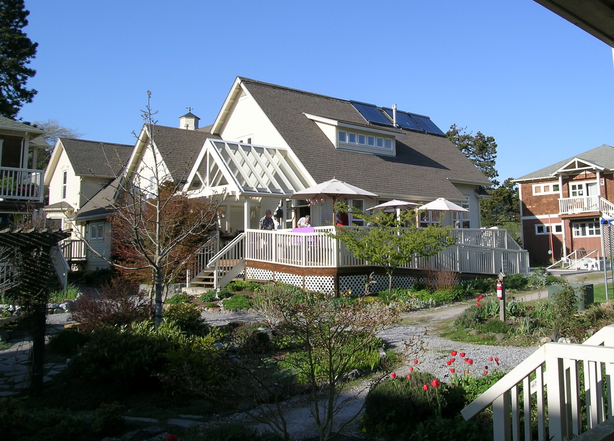 Co-housing community home with solar panels and garden in Bellingham.