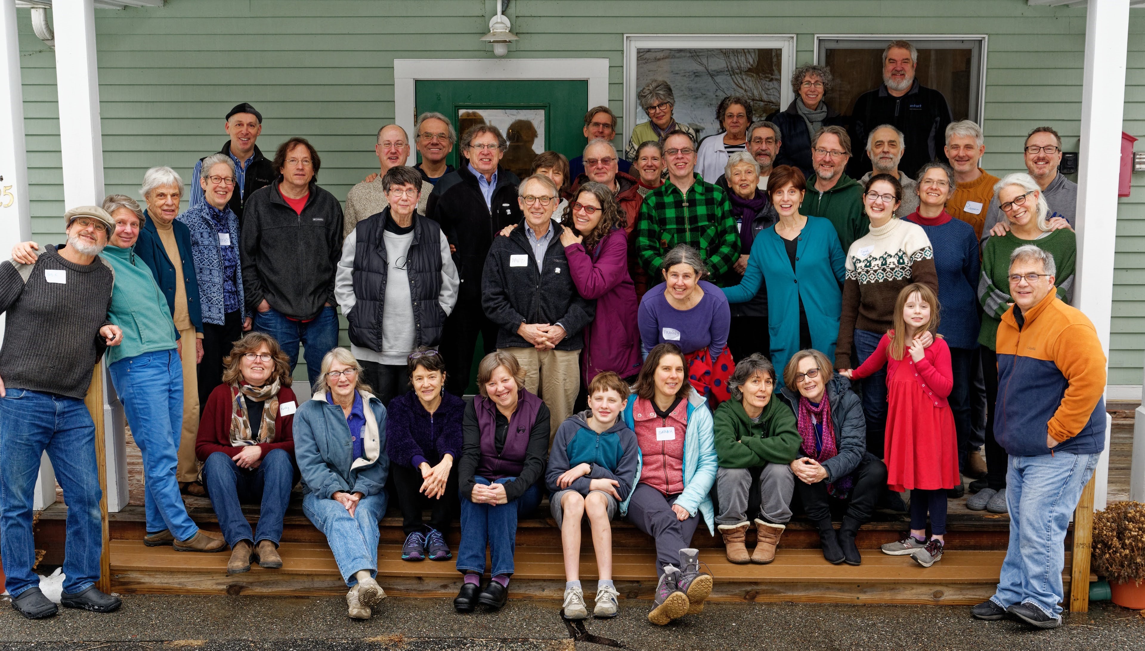 Group photo of diverse residents at New View Cohousing community.