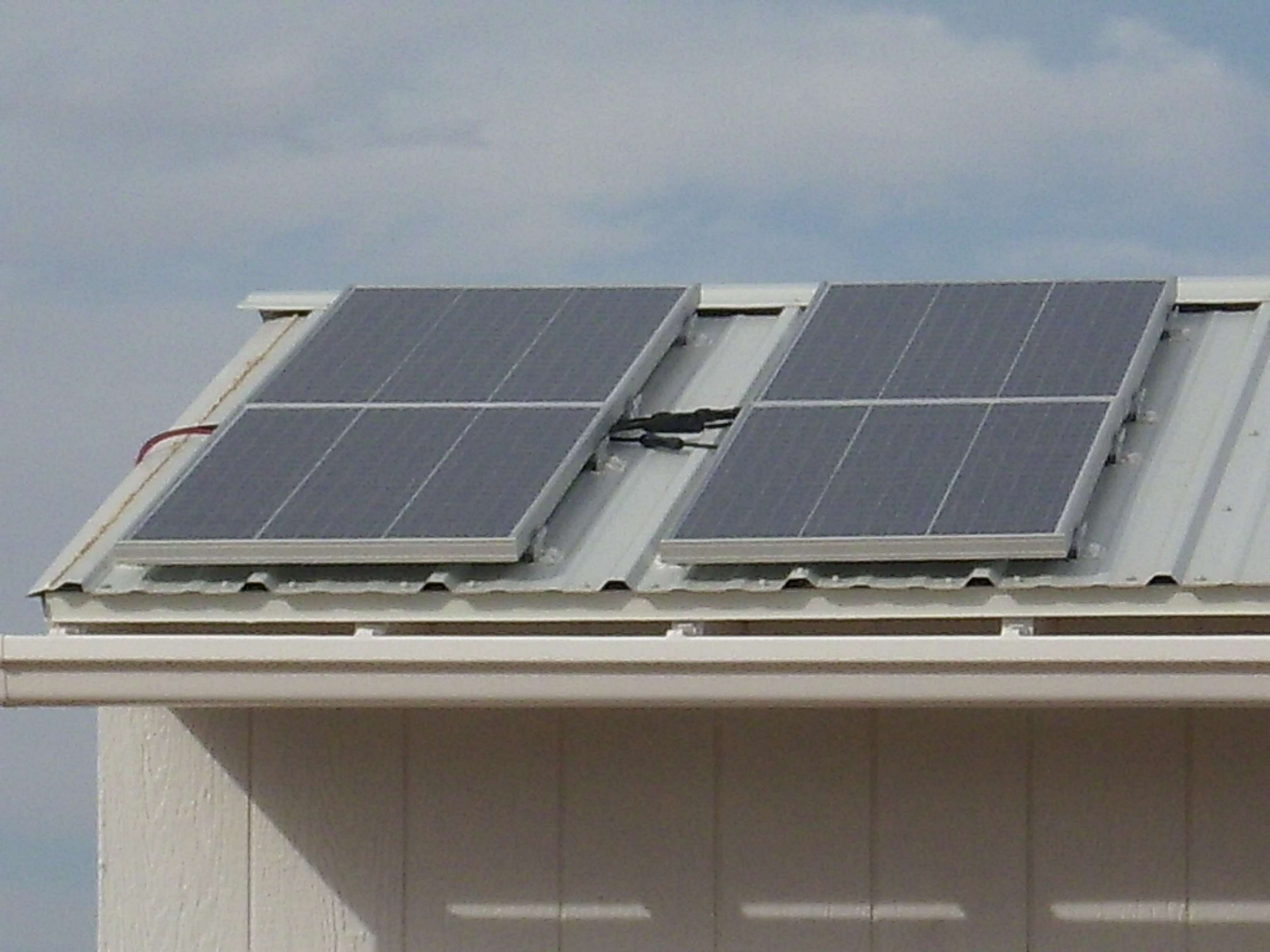 Solar panels installed on a building roof for renewable energy.