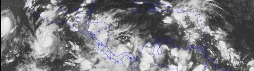 Satellite image of a hurricane forming over the Pacific Ocean.