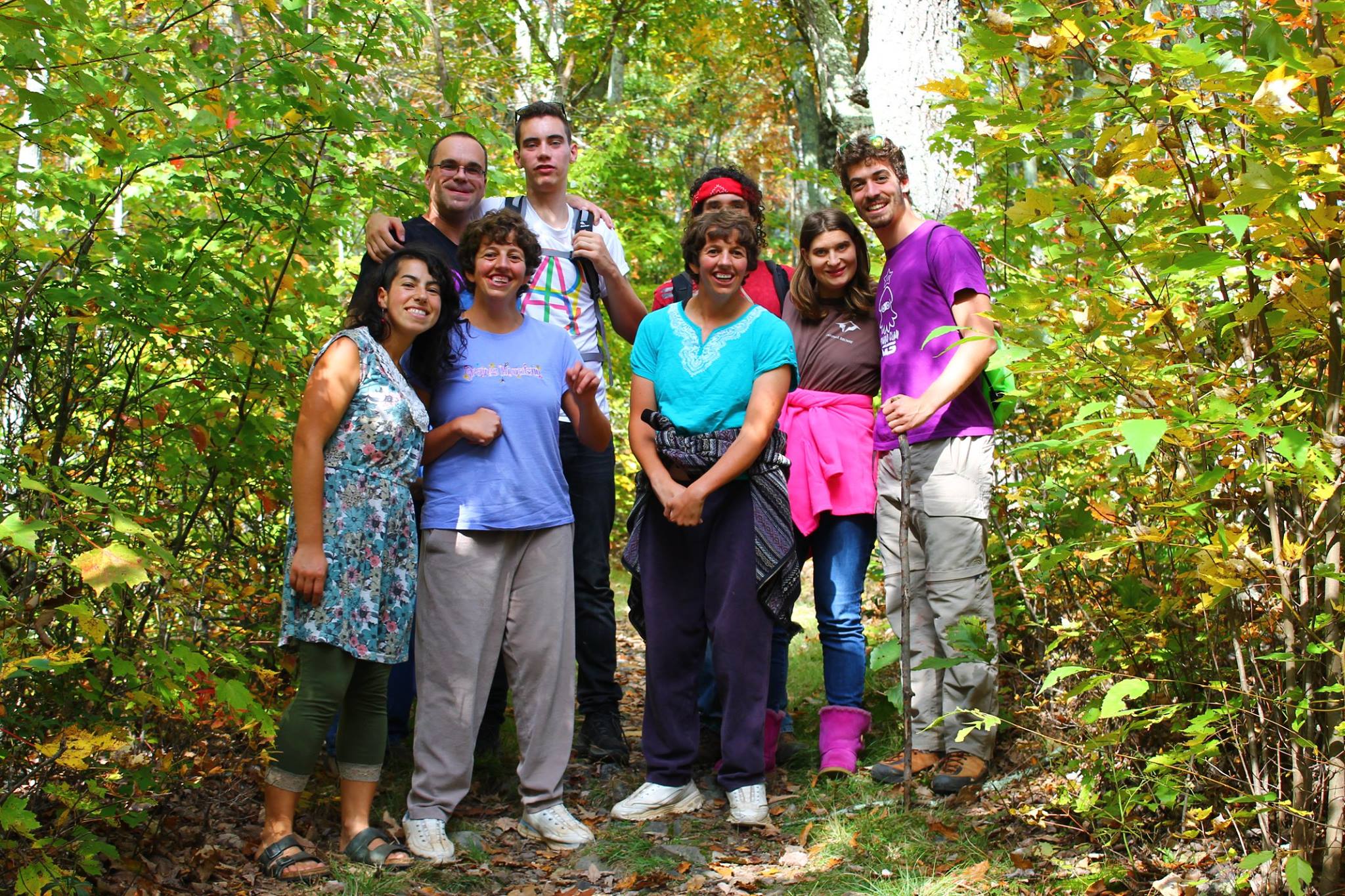 Group of diverse people enjoying nature at Innisfree Village.