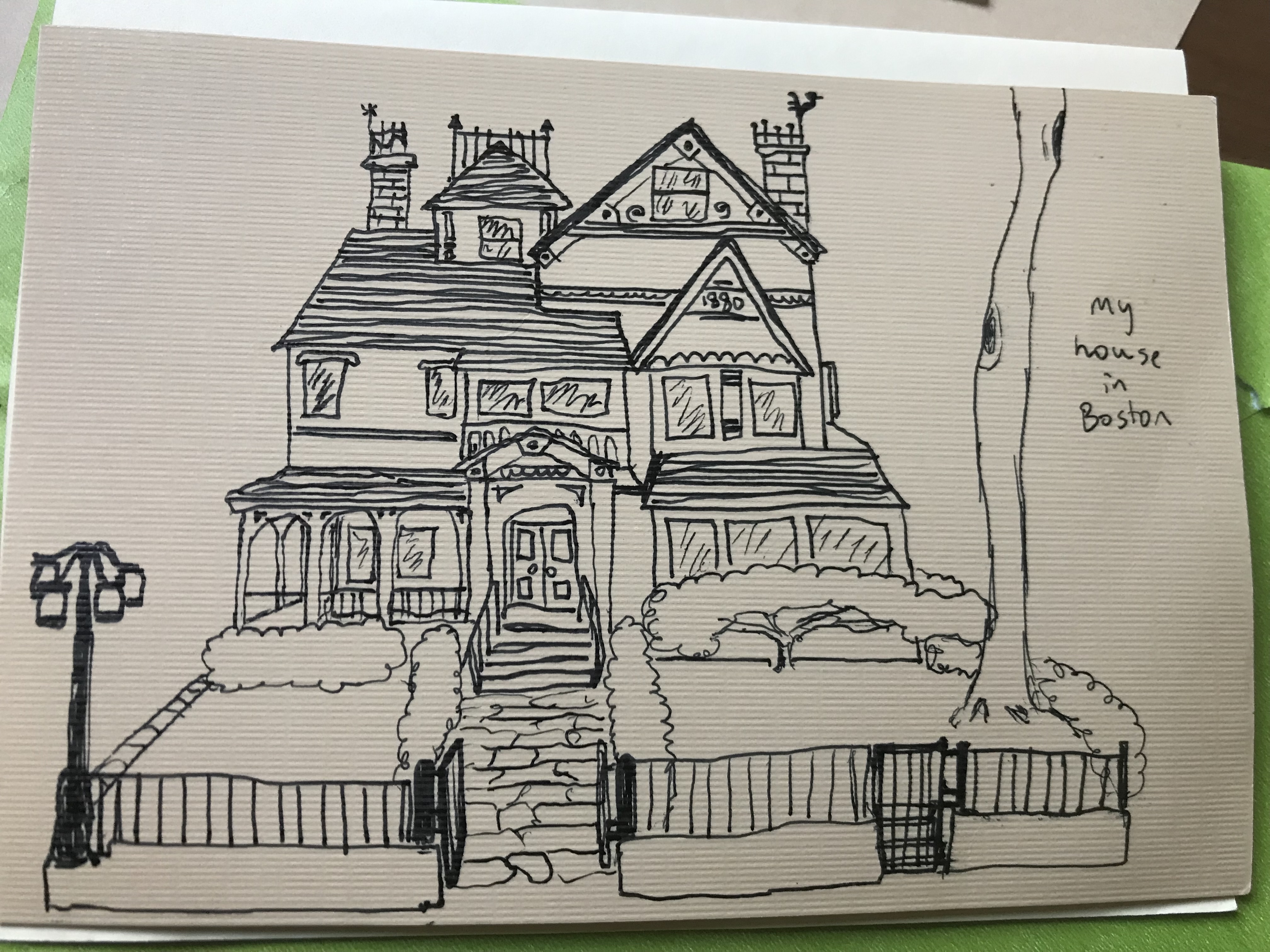 Hand-drawn sketch of a Victorian house in Boston with garden and fence.