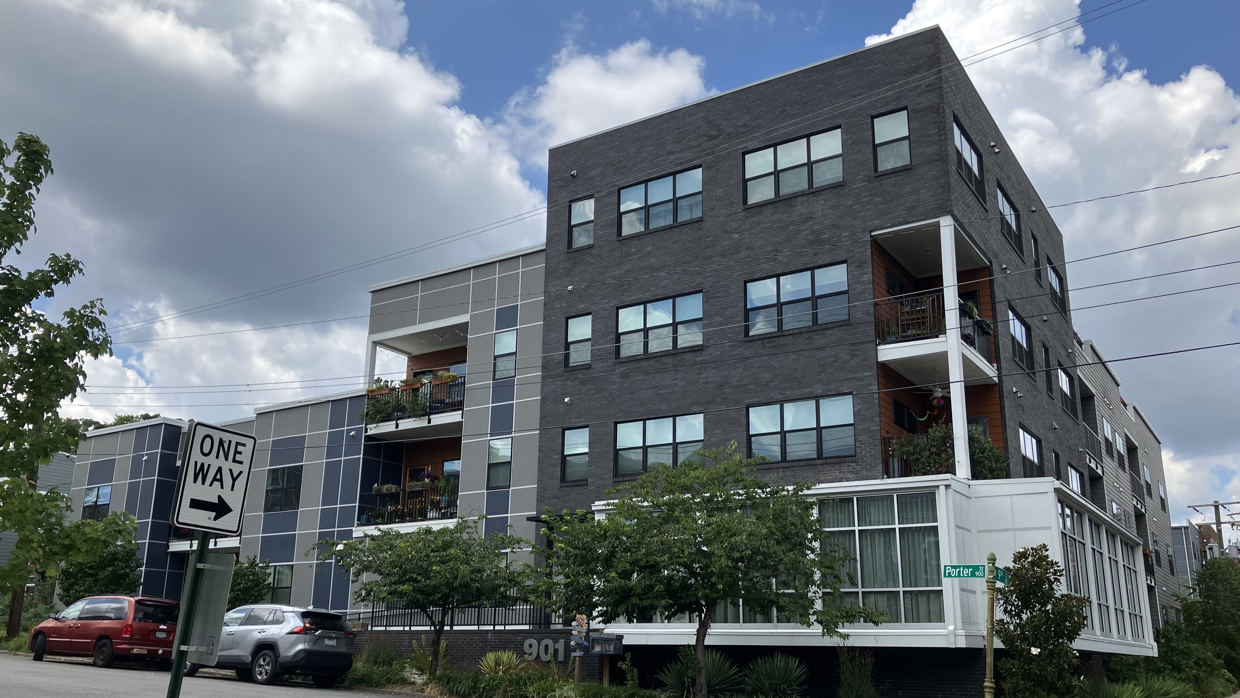 Contemporary apartment complex with balconies and large windows in Richmond.