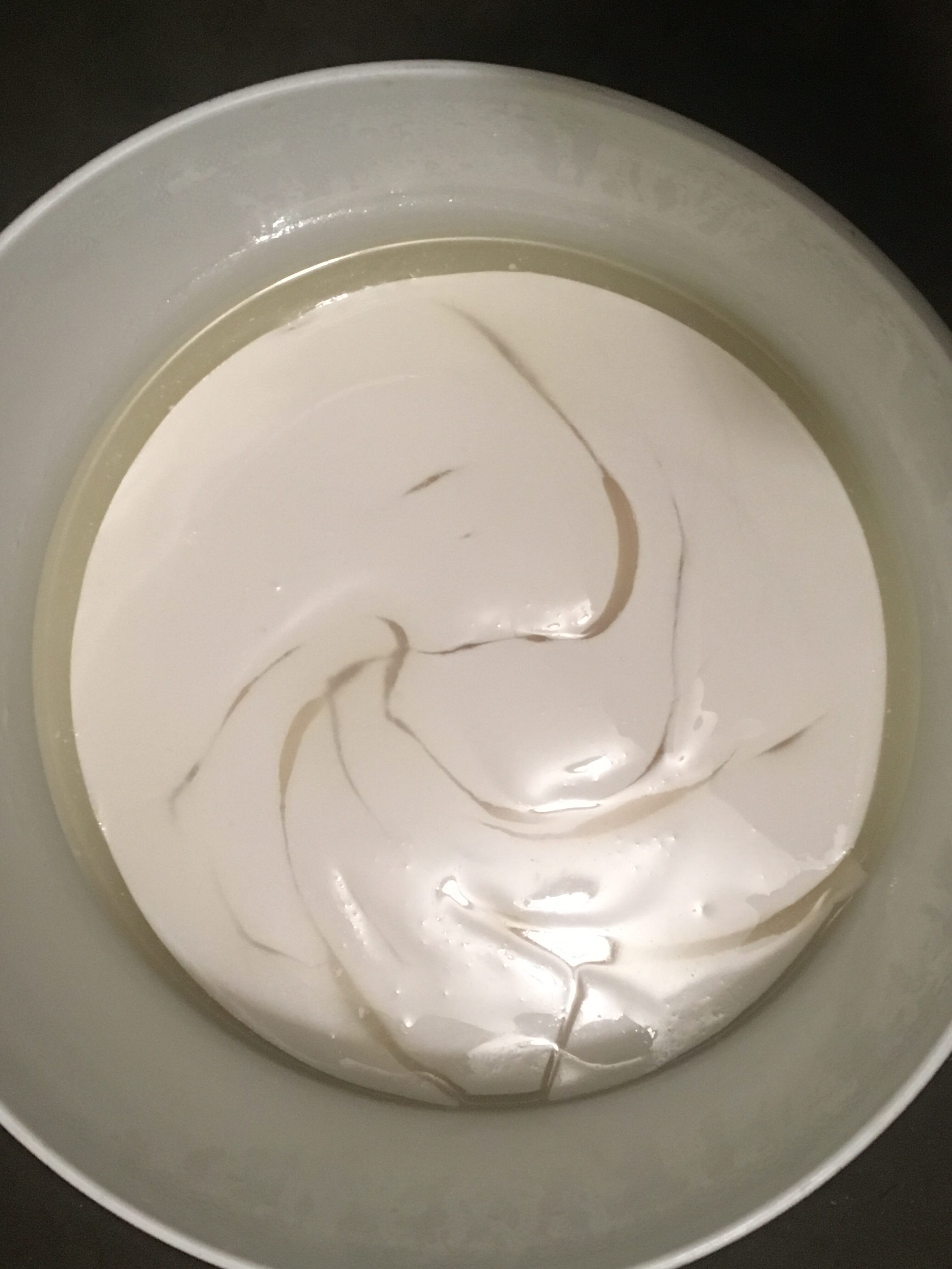 Cream in a bowl, part of sustainable food practices at Uneeda Farm.