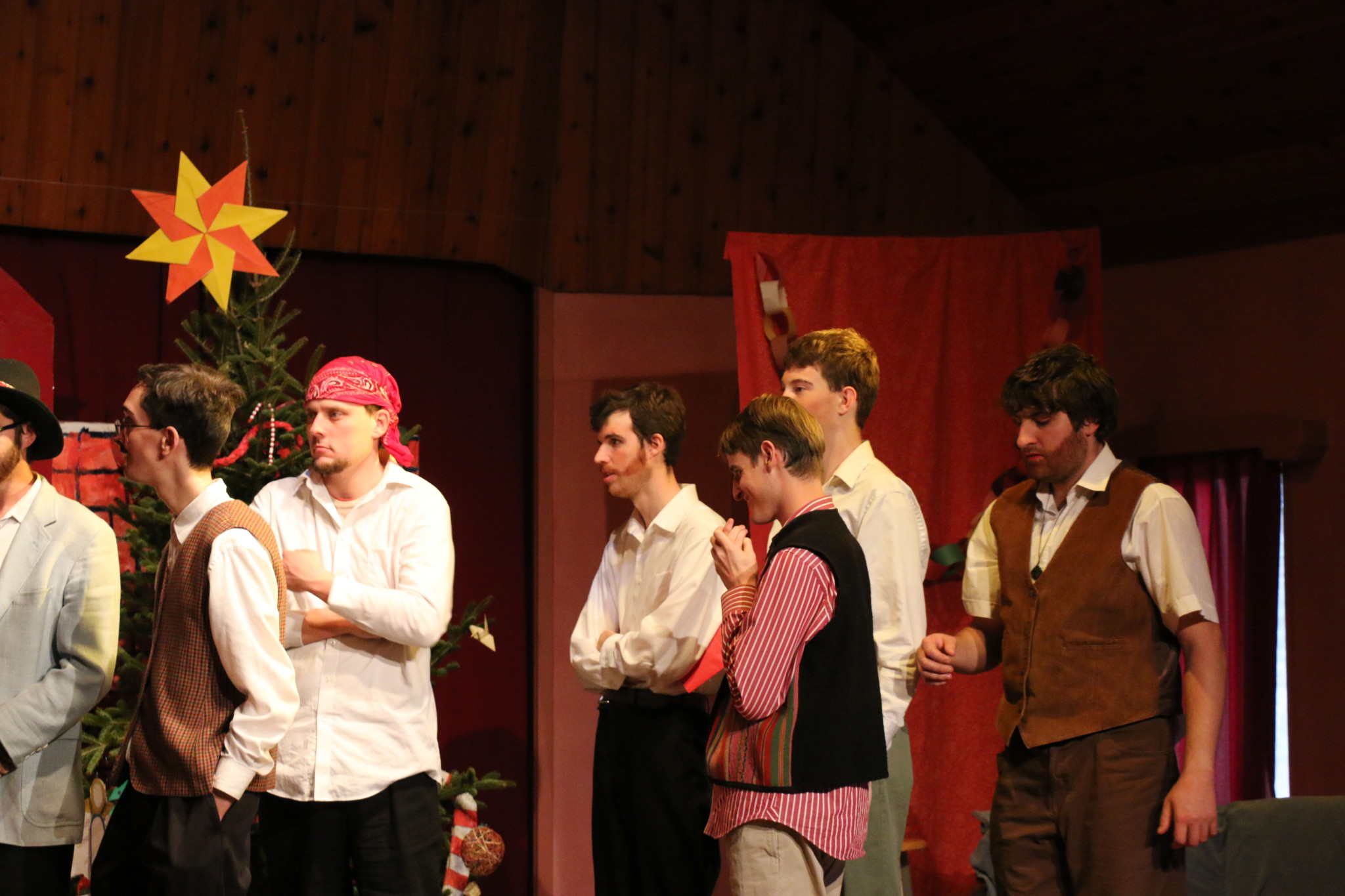 Group of people performing on stage at Triform Camphill Community event.