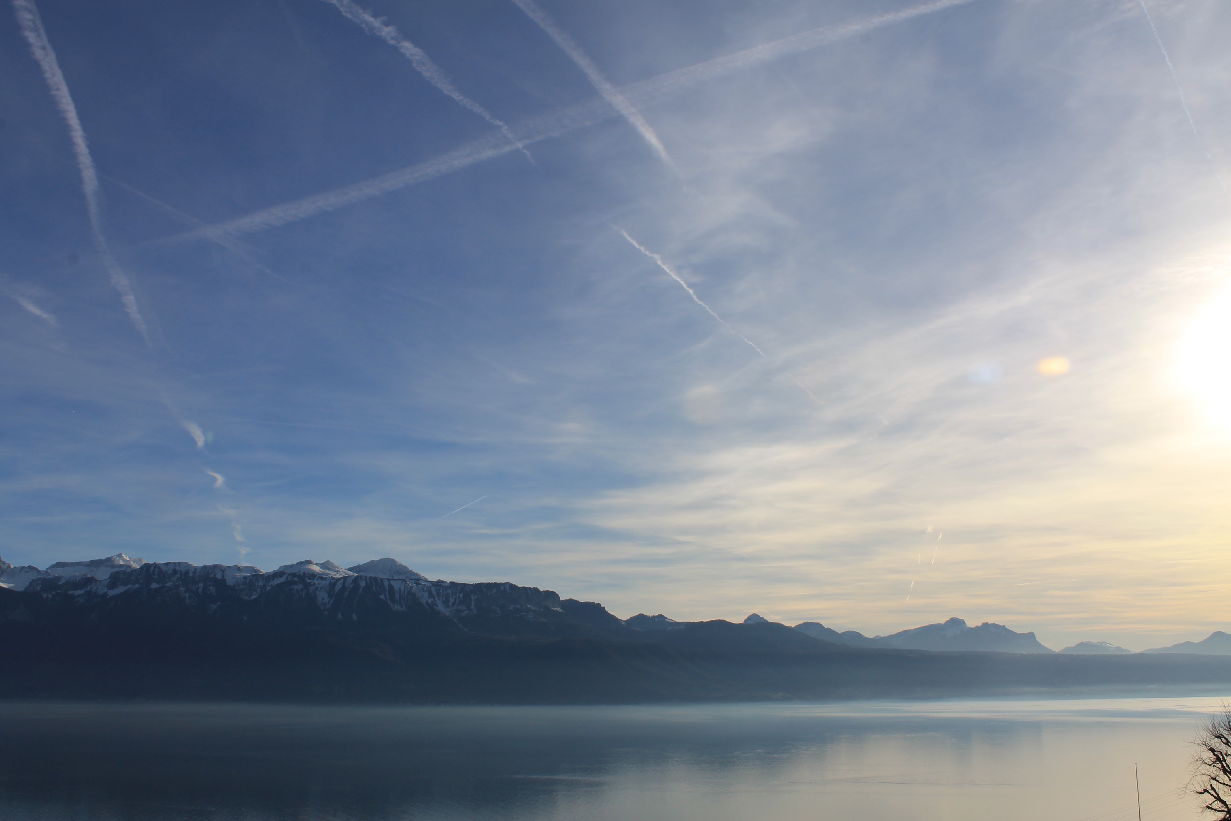 Beautiful mountain landscape with lake and sky during sunset.