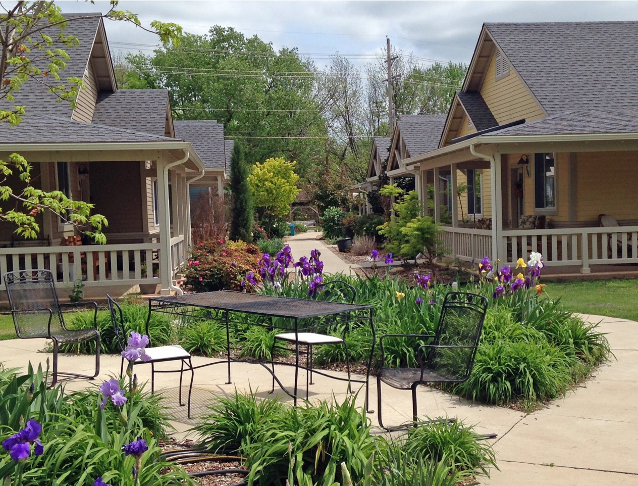 Residential community with garden and outdoor seating in Stillwater Oklahoma.