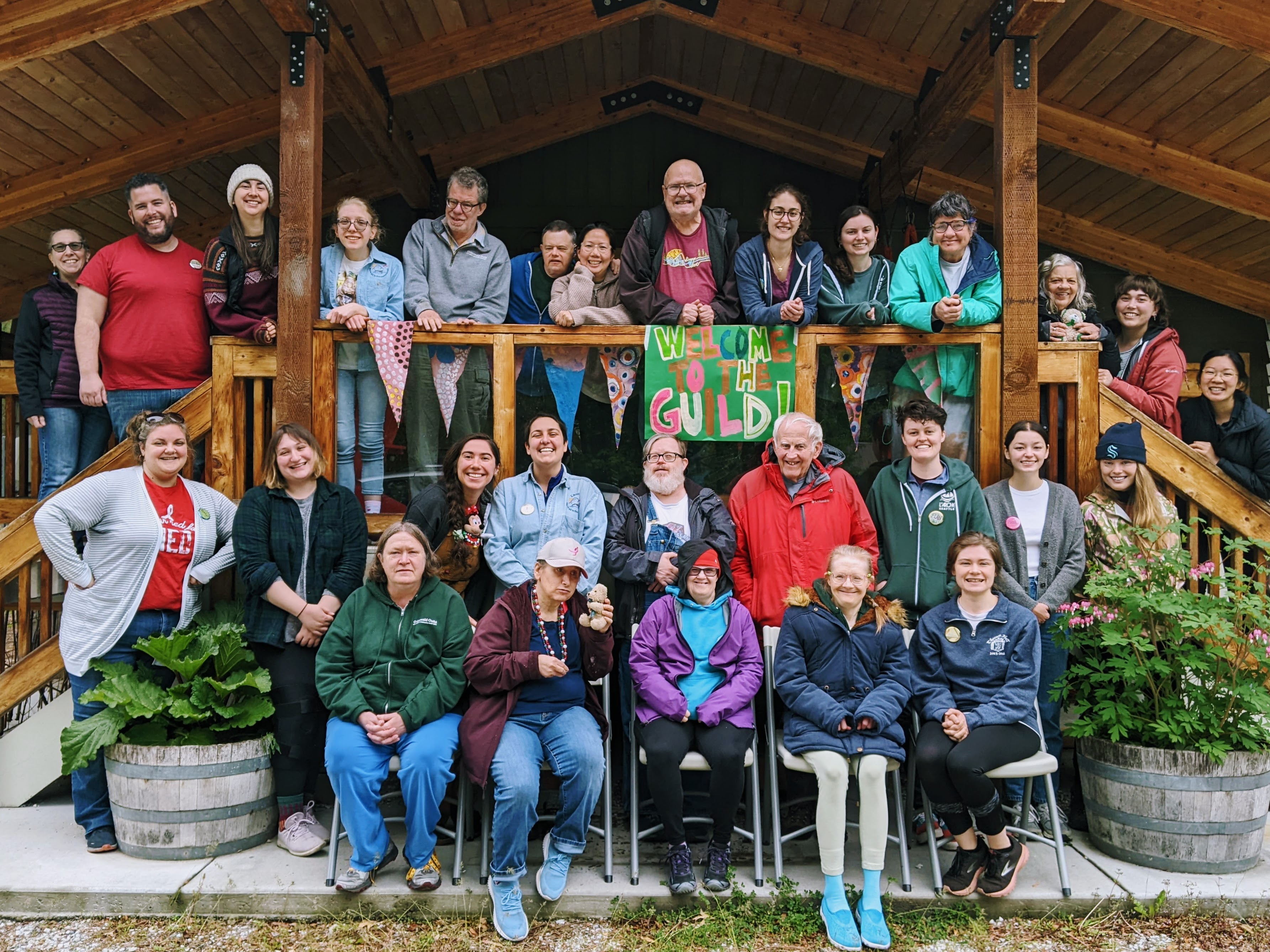 Group photo of diverse community members at L'Arche Seattle gathering.