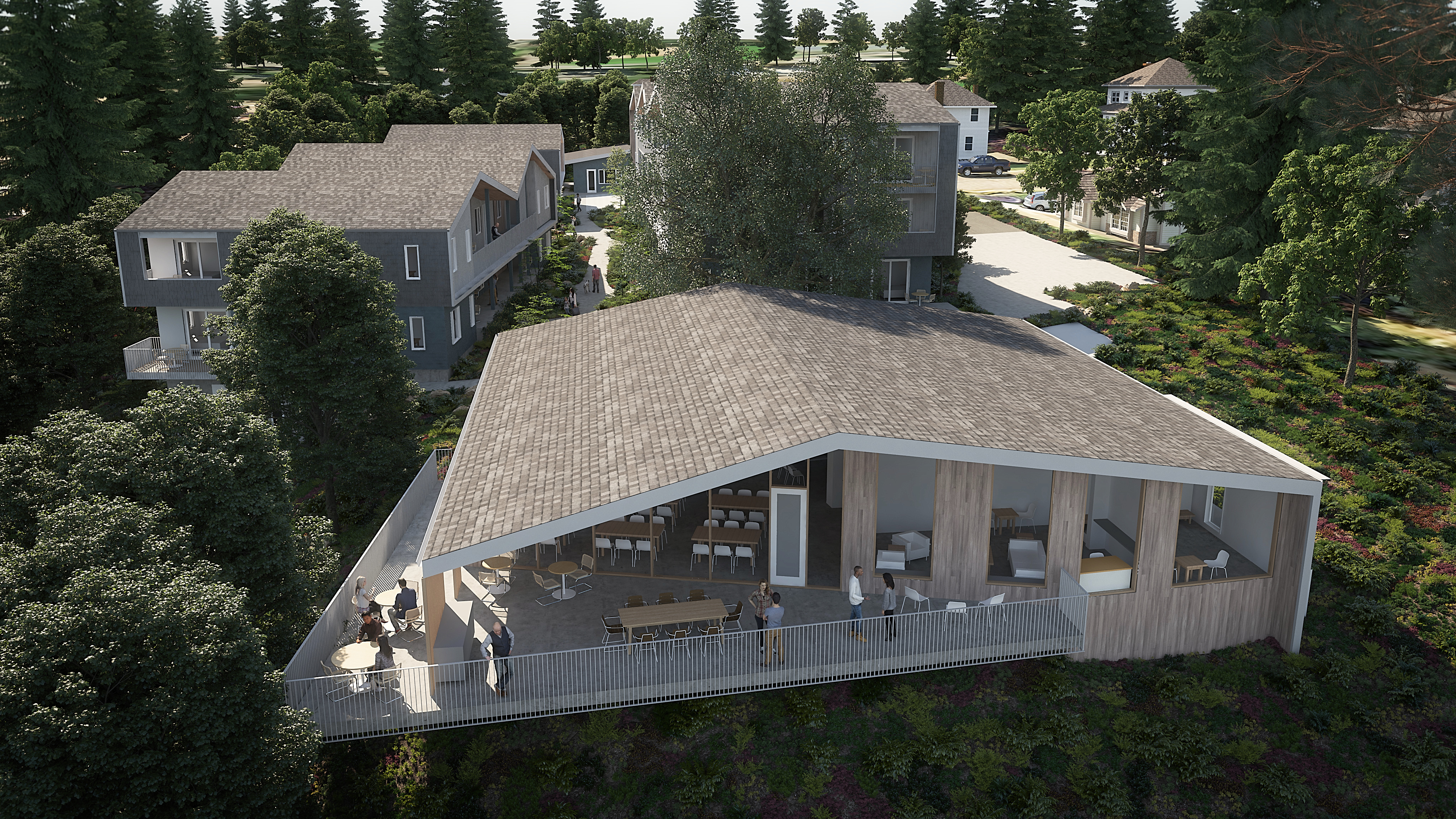 Modern community center with outdoor patio at Adams Creek Cohousing.